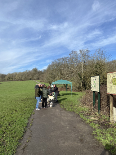 Visitors to the Bentley Priory Nature Reserve engaging with Council staff