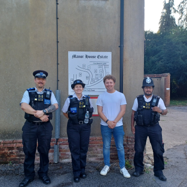 Zak with the local Police SNT