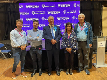 Zak with colleagues after the result of the general election was announced